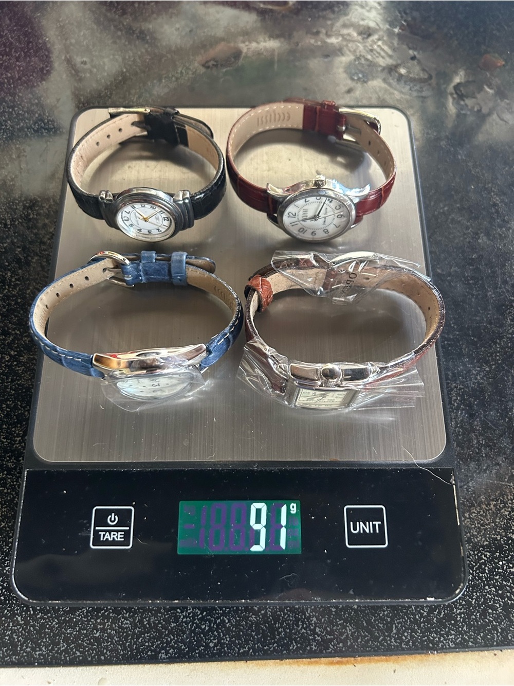 Lot of 4 Women's Leather Strap Watches - Black, Red, Blue, Brown